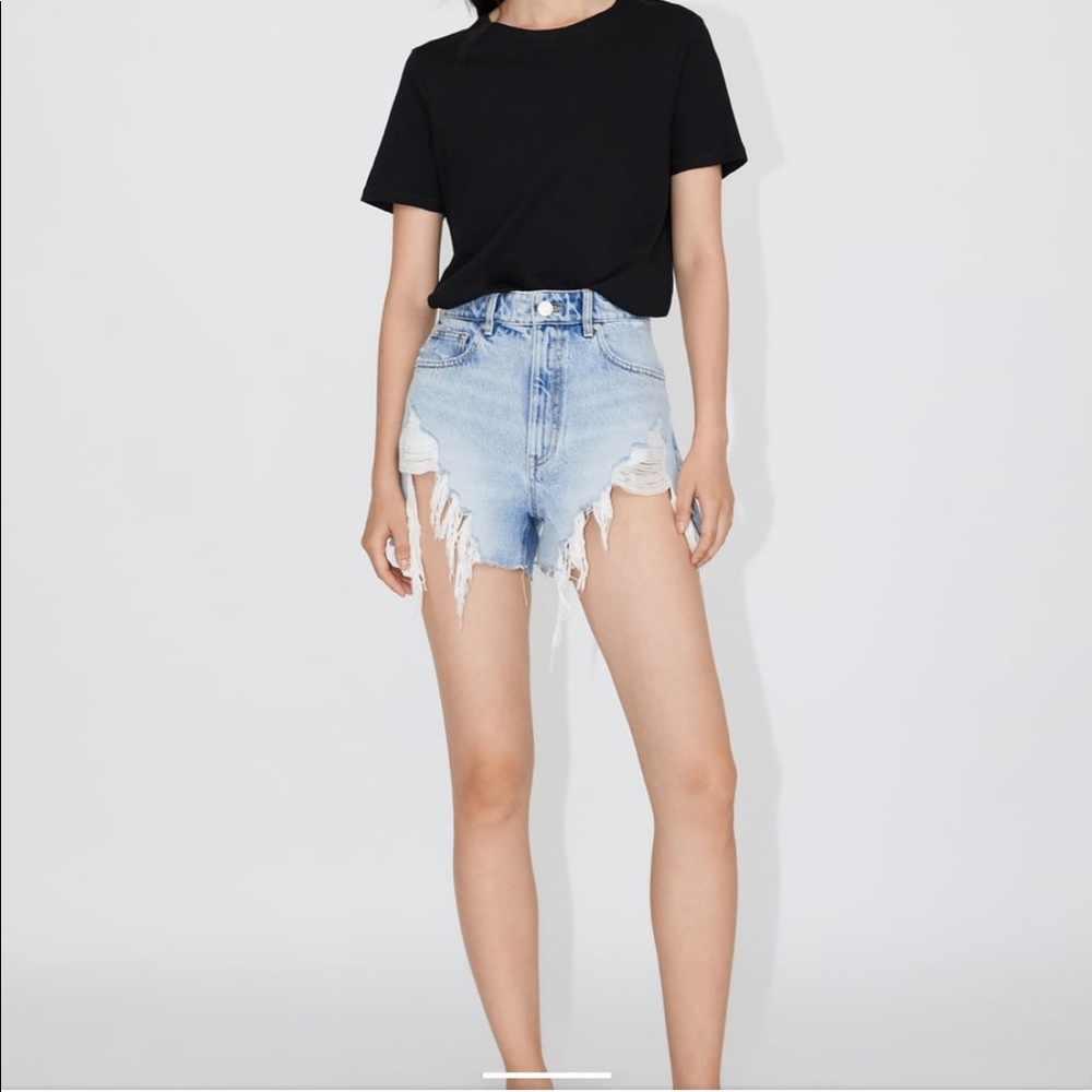 High waisted, distressed shorts